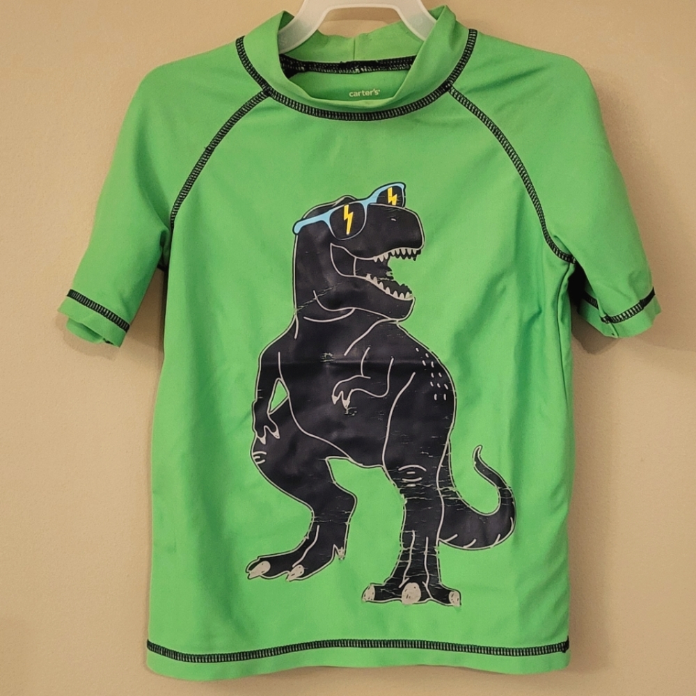 Carter's green rashguard swim top with dinosaur graphic